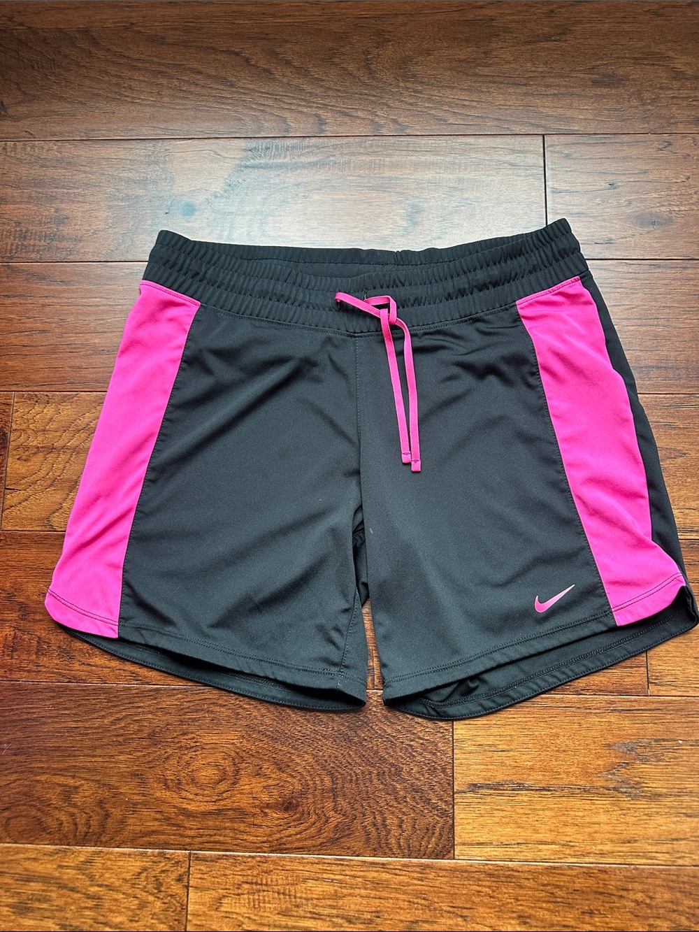 Nike Women’s Black and Hot Pink Athletic Shorts
